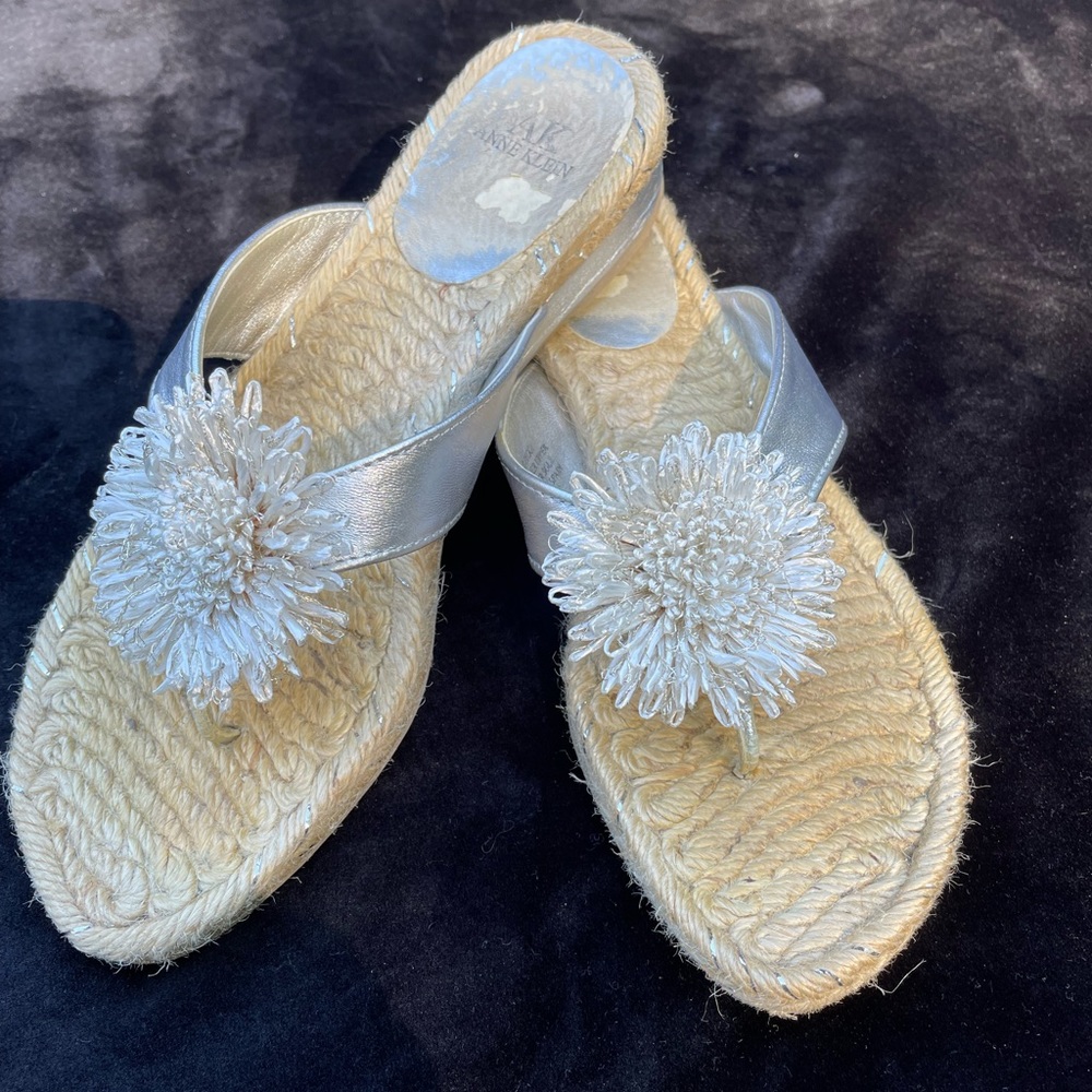 Anne Klein silver sandals with a raffia flower.